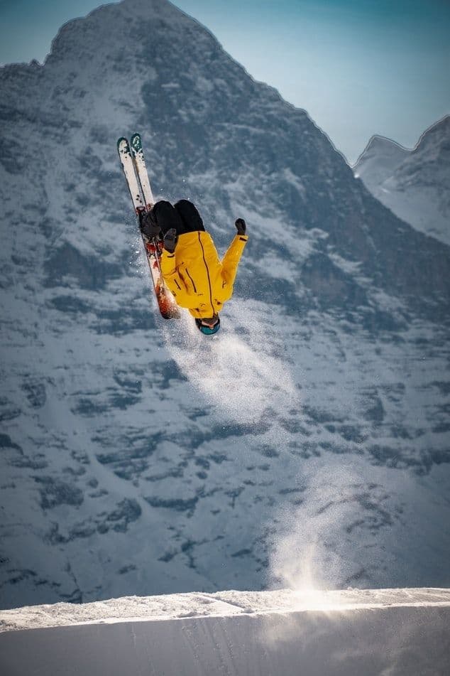 Skier mid-air with Airmo airtime HUD